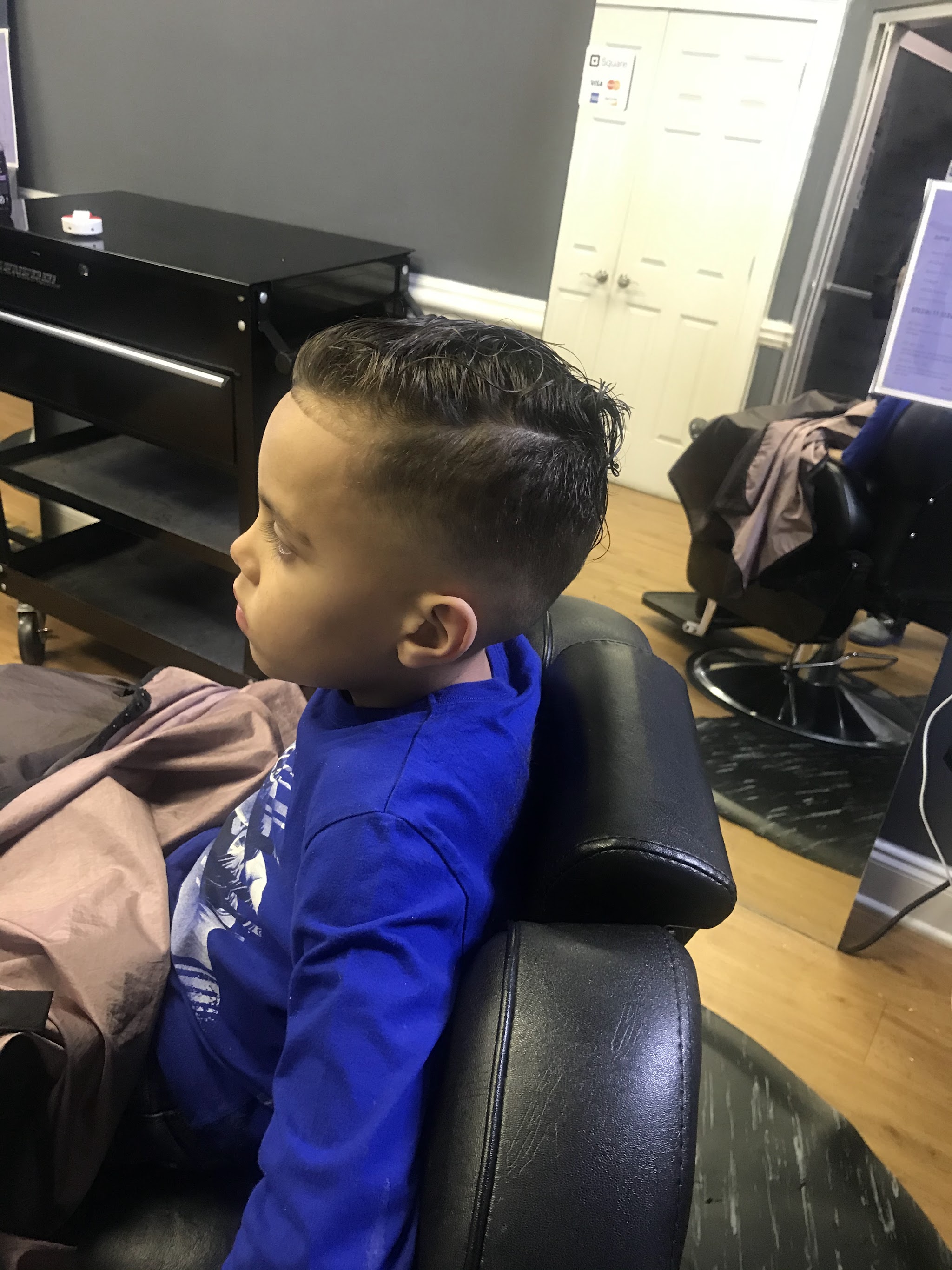 A young boy with a fresh cut