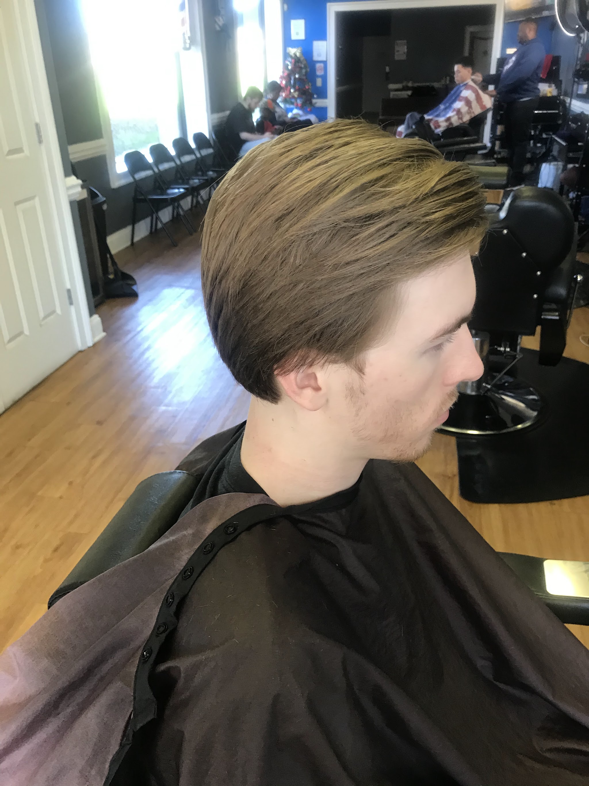 A side-swept cut on a young man